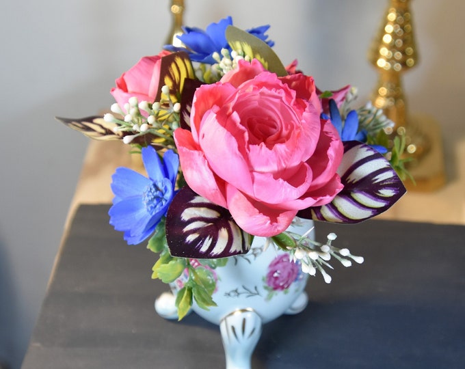 Beautiful hand-painted, footed, antique, egg shaped vase filled with bright and cheerful airbrushed Sola wood flowers