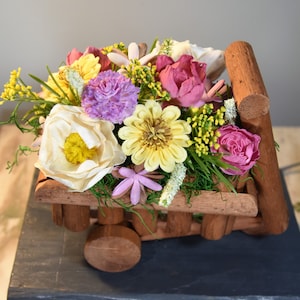 Bright cheerful garden arrangement of hand-painted and airbrushed Sola wood flowers in a wood garden cart-wheelbarrow, brighten any space