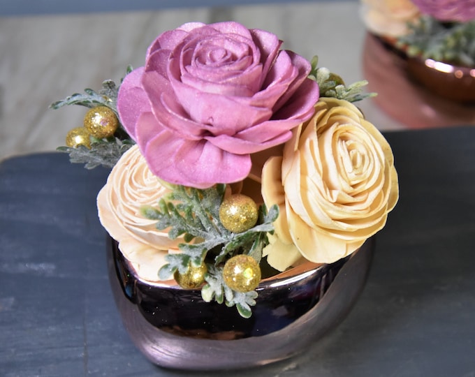 Elegant rose gold ceramic heart filled with long lasting sustainable Sola wood roses dyed shimmering rose gold and sparkling champagne white