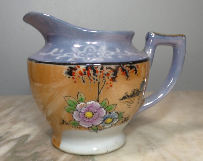 Small antique blue luster-ware creamer/pitcher with hand painted exquisite details. Stamped Japan before occupation 1920-1945