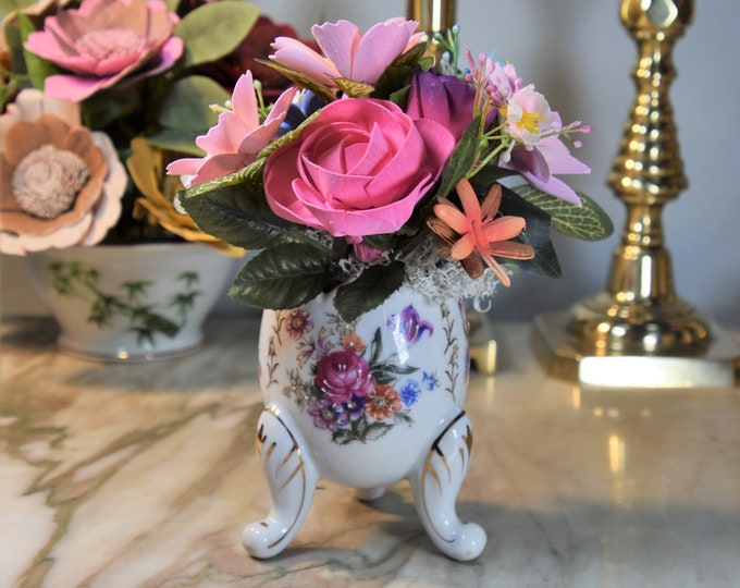 Beautiful hand-painted, footed, antique, egg shaped vase filled with airbrushed bright cheerful Sola wood flowers.