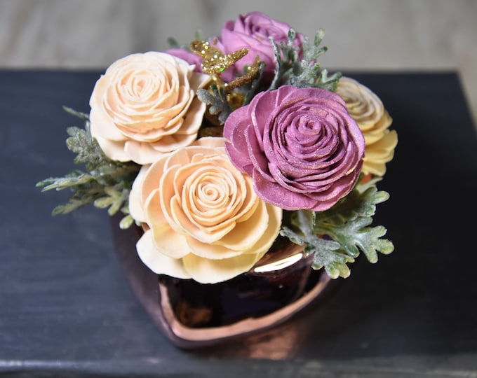 Elegant rose gold ceramic heart filled with long lasting sustainable Sola wood roses dyed shimmering rose gold and sparkling champagne white