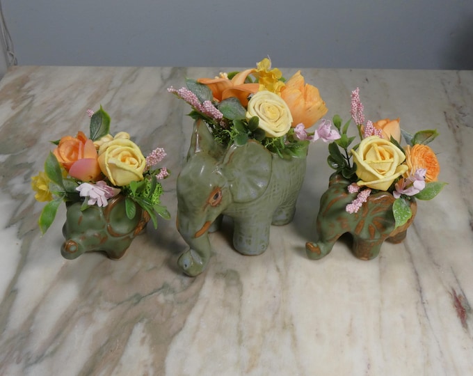 Three small elephant planters -mother and two babies - filled with Sola wood flowers - great gift or decor