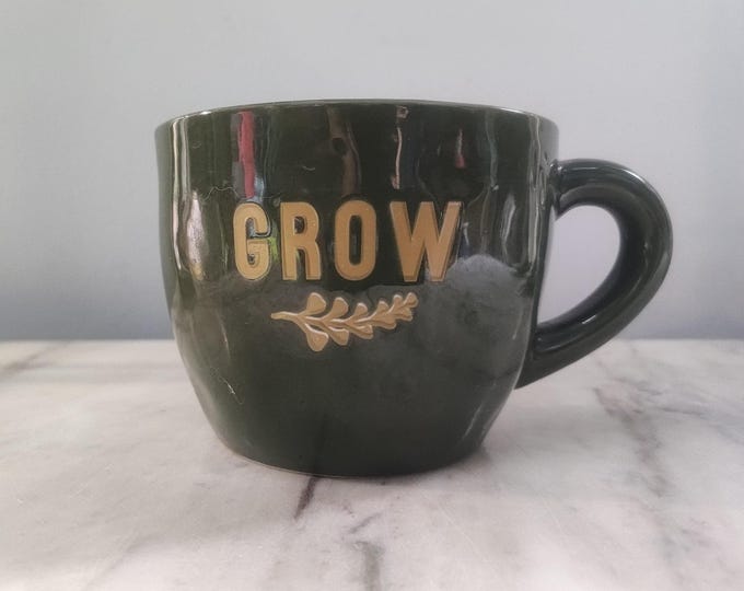 16 oz mug that says "GROW" - purchased to fill with flowers, but you can fill with coffee, latte, tea....!