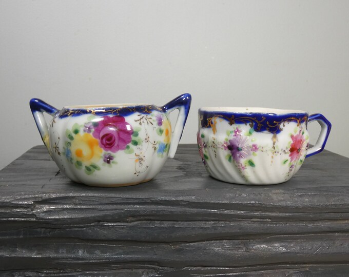 Vintage small stunning hand-painted shaped pieces teacup and open sugar bowl white with blue Japan 1920-1940