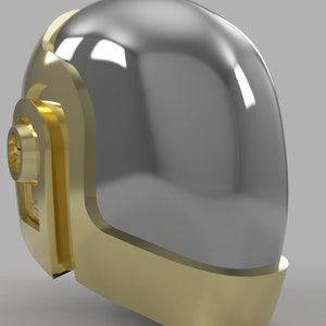 Puede incluir: Un casco dorado y gris con una visera grande y transparente. El casco tiene una banda dorada alrededor de la parte inferior y un detalle dorado en el lateral.