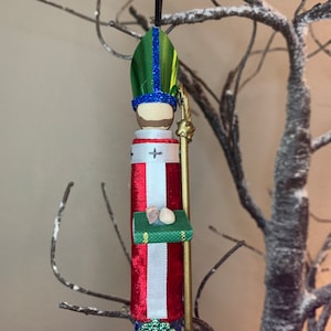 Adorno de muñeca de madera de San Liborio