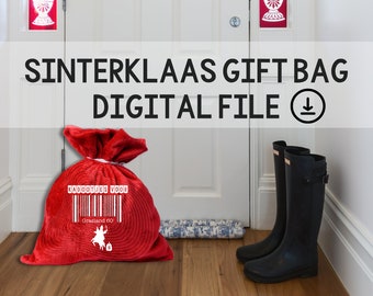 May include: Red felt gift bag with white text that says "Kadootjes voor Grasland 80" and a barcode. The bag is sitting on a wooden floor in front of a white door. There are two black rain boots on the floor.