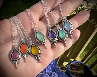 Rainbow North Star Pendants Sterling silver with various stones. Hallmarked. Chain length is 18inch