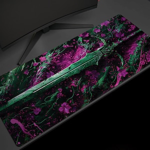 May include: A rectangular mousepad featuring a green and purple fantasy design. The design includes a detailed green sword, purple floral accents, and a dark green background. The mousepad is placed on a gray desk next to a computer monitor.