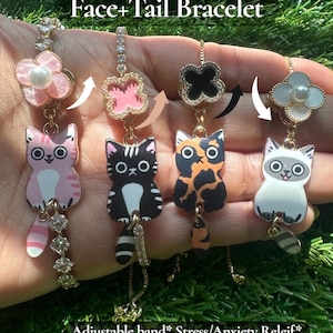 May include: Four bracelets featuring rotating cat charms with tails, each with a unique color pattern including pink, black, tortoiseshell, and Siamese-style. The text reads Fidget/Rotating Cat Face+Tail Bracelet, Adjustable band* Stress/Anxiety Releif* Personalize with initial.