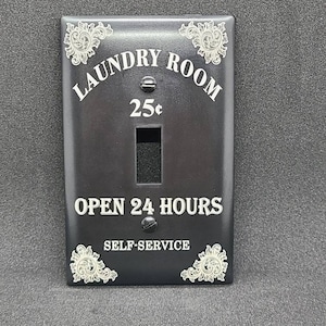 Laundry room light switch and outlet plates laser engraved. Multiple options