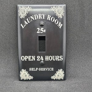 Laundry room light switch and outlet plates laser engraved. Multiple options