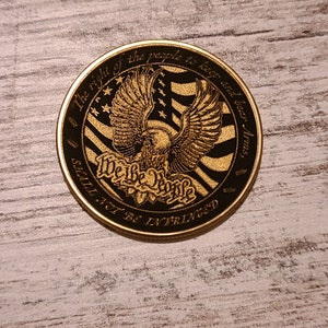 2A brass carry coin