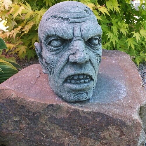Zombie head statue for gothic home decor. Decorative skull figure to create zombies Halloween decor. shops Horror yard art