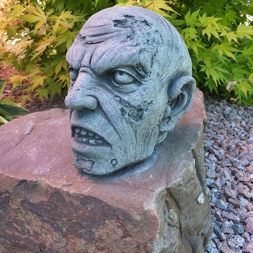 Zombie head statue for gothic home decor. Decorative skull figure to create zombies Halloween decor. shops Horror yard art