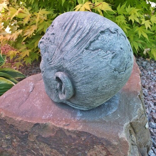 Zombie head statue for gothic home decor. Decorative skull figure to create zombies Halloween decor. shops Horror yard art