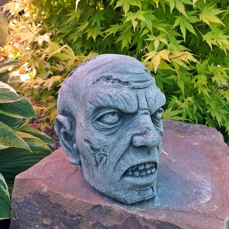 Zombie head statue for gothic home decor. Decorative skull figure to create zombies Halloween decor. shops Horror yard art