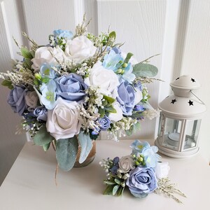 Dusky Blue Rose Wedding flowers. Bouquets, Buttonholes, Corsages, Flower Girl Wands to match.