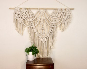 Large, macrame wall-hanging décor