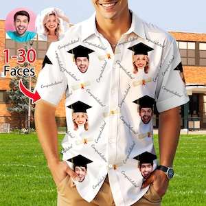 May include: White button-down shirt with a graduation cap and diploma pattern. The shirt has the text "Congratulates!" repeated throughout the pattern.