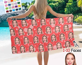 May include: A red beach towel featuring a repeating pattern of a person's face with their tongue sticking out, surrounded by white polka dots. The towel is held by a person on a beach. The text "1-10 Faces" is visible. A color chart is in the upper left corner.