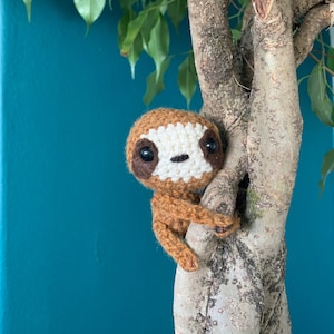Crochet sloth plant buddy