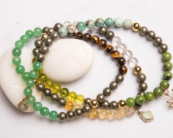 Pulsera de cristal de la prosperidad: aventurina, ojo de tigre, pirita, citrino y cuarzo.