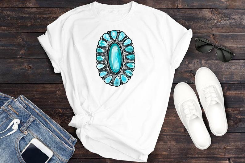 May include: White t-shirt featuring a turquoise and silver turquoise-style design.