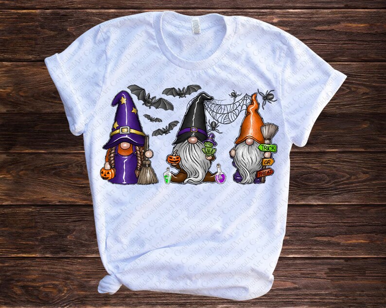 May include: Three gnomes dressed in Halloween costumes. The gnome on the left is wearing a purple and black witch hat and holding a broom. The gnome in the middle is wearing a black hat and holding a pumpkin. The gnome on the right is wearing an orange hat and holding a sign that says "Trick or Treat".