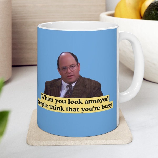 Seinfeld George Costanza Mug | "When you look annoyed, people think you're busy" Seinfeld Mug, Funny Seinfeld quotes, Seinfeld quote mug