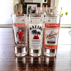 Vintage shooter glasses, set of 3 | Malibu Rum | Beefeater Gin | Stolichnaya Vodka | Luminarc, France, 1990&#39;s