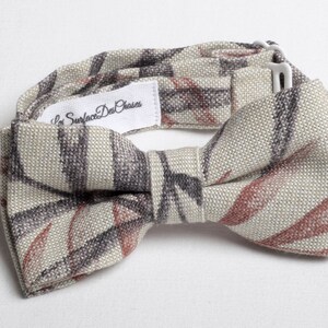 Children&#39;s linen bow tie with leaf patterns