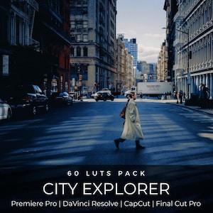 Puede incluir: Una escena de la calle de la ciudad con una persona cruzando la calle. La imagen tiene una paleta de colores azul y gris. El texto en la parte inferior dice "60 LUTS PACK CITY EXPLORER Premiere Pro | DaVinci Resolve | CapCut | Final Cut Pro."