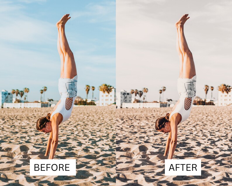 May include: A woman in a white tank top and denim shorts does a handstand on a sandy beach. The sky is blue and there are palm trees in the background.