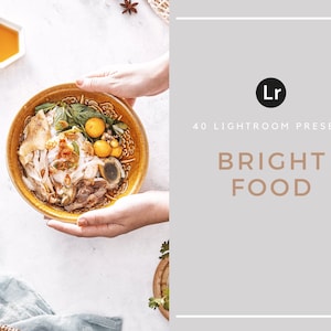 May include: A bowl of Vietnamese chicken noodle soup with a variety of toppings, including egg, herbs, and meat. The bowl is held by two hands against a white background. The text "40 Lightroom Presets Bright Food" is displayed on a grey background.