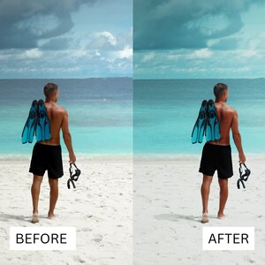 May include: A person standing on a white sandy beach, facing away from the camera, wearing black swim trunks and carrying a pair of blue flippers and a black snorkel mask. The person is looking out at the ocean, which is a bright turquoise color. The sky is a light blue with some white clouds.