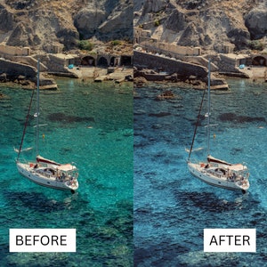 K&ouml;nnte beinhalten: Ein wei&szlig;es Segelboot mit einem roten Streifen am Segel liegt in t&uuml;rkisblauem Wasser vor Anker. Das Wasser ist klar und man kann den Grund sehen. Das Boot befindet sich vor einer felsigen Klippe.