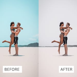 May include: A couple is hugging on a white sandy beach. The woman is wearing a black bikini and the man is wearing black swim trunks. The couple is looking at each other and smiling.