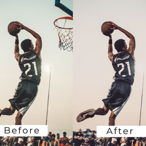 Op de afbeelding: Een basketballer in een zwart shirt met nummer 21 op de rug springt om een basketbal te dunken. De speler is in de lucht met zijn rug naar de camera. De speler staat voor een menigte mensen.