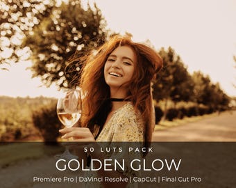 May include: A woman with red hair smiles while holding a glass of wine. The image has a warm, golden tone. Text on the image reads "50 LUTS PACK GOLDEN GLOW Premiere Pro | DaVinci Resolve | CapCut | Final Cut Pro."