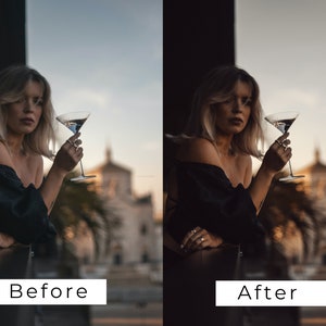 Op de afbeelding: Een vrouw in een zwart topje met blote schouders houdt een martini-glas vast met een heldere vloeistof. Ze staat voor een raam met een wazige achtergrond van een straat in de stad.