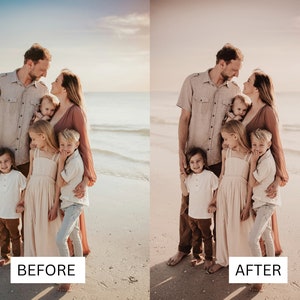 May include: A family of seven poses on a sandy beach at sunset. The parents are standing in the center, with their five children in front of them. The family is wearing casual clothing, and the children are smiling.
