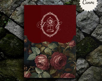 Puede incluir: Una tarjeta de invitación burdeos con un diseño floral. La sección superior presenta un marco blanco adornado con una rosa en una cúpula de cristal y las iniciales "J C". La sección inferior tiene un patrón floral oscuro con rosas.