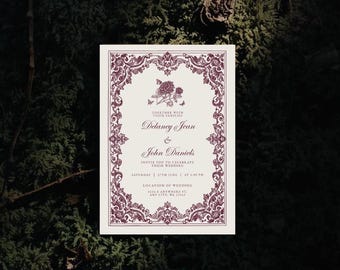 May include: A rectangular wedding invitation card featuring a dark maroon ornate damask border, a central floral illustration with butterflies, and printed text announcing the marriage of Delaney Jean and John Daniels on Saturday, 27th June.