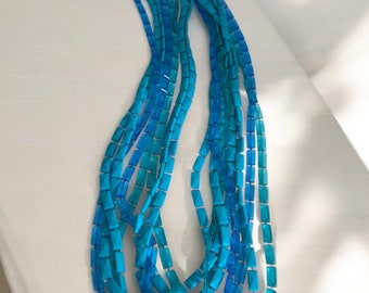 Vintage 60s long strand aqua blue beaded necklace/plastic beaded necklace/vintage costume jewelry