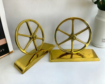brass bookends Virginia Metalcrafters  Wagon wheel bookends/vintage home decor
