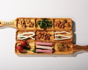May include: A wooden serving tray with three sections, each with a different food item. The tray is engraved with the names "SARAH" and "MICHAEL".