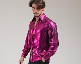 May include: A shiny, magenta-colored button-down shirt with long sleeves. The shirt has a glossy, metallic finish and a classic collar. The fabric appears to be lightweight and drapes smoothly. The shirt is unbuttoned at the top.