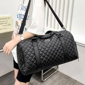 Gucci duffle deals bag womens